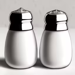 pair of salt and pepper shakers with black caps