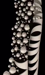 the abstract composition is made out of white and black balls