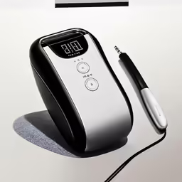 the clock timer has been placed next to the cord