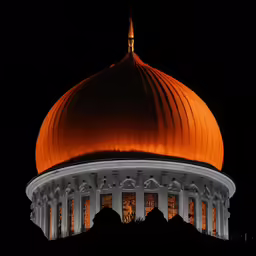 a lighted dome on top of a building