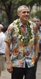 a man wearing a lei and a flower shirt