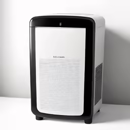the back end of a computer next to a page