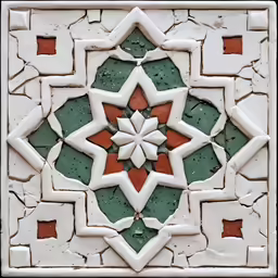a white and green flower made from ceramic tiles