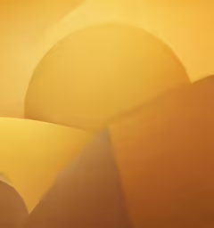 an abstract painting shows the sun with golden hues
