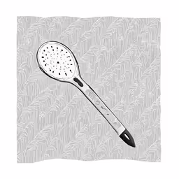 a white spatula is sitting on a surface