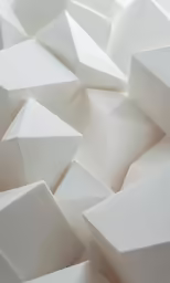 white cubes stacked up with each other