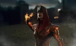 a man dressed in costume holding up a lit candle
