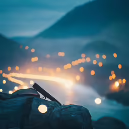 a photo of the night and the light on a rock