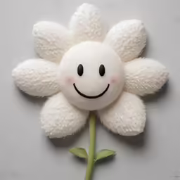 a white flower is made from foam and plastic