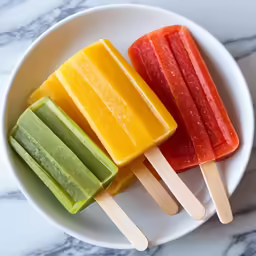 an image of pops and pieces of fruit