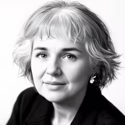 a black and white portrait of a woman