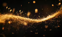some sprinkles are coming out of a yellow liquid