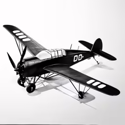 a small plane with two propellers flying over the ground