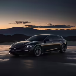 a dark bmw concept car in front of a sunset