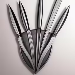 an image of a sculpture that is holding knives