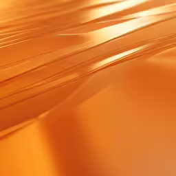 an abstract image with a gold colored background