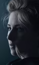 the face and neck of a woman looking off to the side