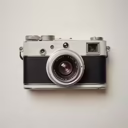 an old fashioned camera hanging off the wall