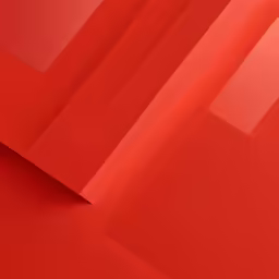 red paper is covering the surface of an object