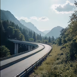 an empty road with hills in the background