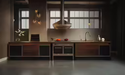 a kitchen with modern appliances and wooden cabinets