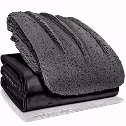 black towels are stacked on top of each other