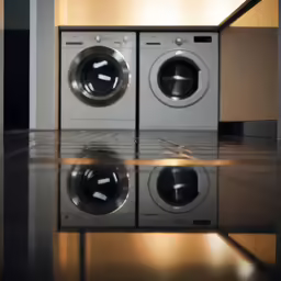an image of two washing machines that are close together