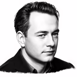 black and white portrait of a man looking into the distance