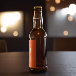 a bottle of beer on a table with white light around it