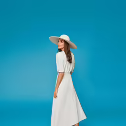 a young woman is wearing a white hat