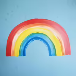 painting of a rainbow over blue sky