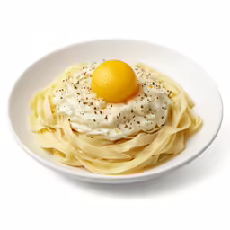 a plate with noodles and an egg