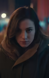 a close up of a person with a coat