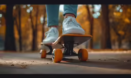 person riding on top of a skateboard on road