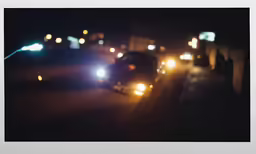 multiple traffic on a dark road at night