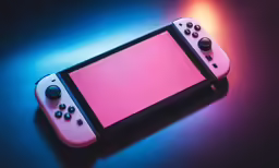 a nintendo wii game console with a neon pink background
