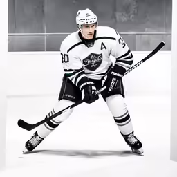 a man with a hockey stick wearing an uniform