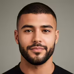 an image of a man with beard and balding
