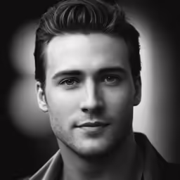a man is photographed in a black and white photo