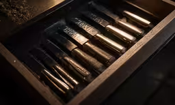 a drawer filled with a knife set inside of it