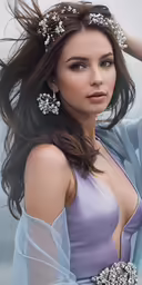 a woman in a gown holding a head piece