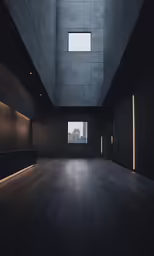 empty room with dark walls, wooden floor and two windows