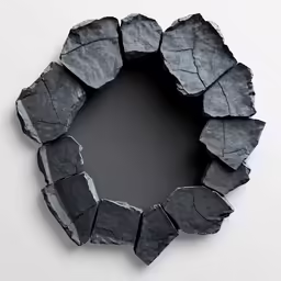 a grey piece of rocks with one side torn open