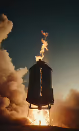 a smokestack emits from the ground as it burns