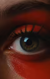 a woman with blue eyeliners and dark red lips