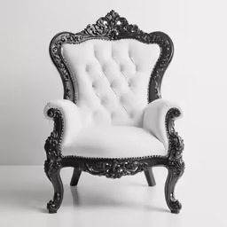 an ornate white chair with black accents