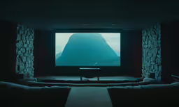 a tv screen showing a large mountain view