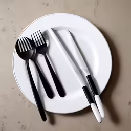 the fork has a black handle on it