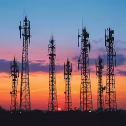 an image of many cell towers in the night sky
