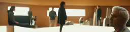 a man is reflected in the mirrors of some men
